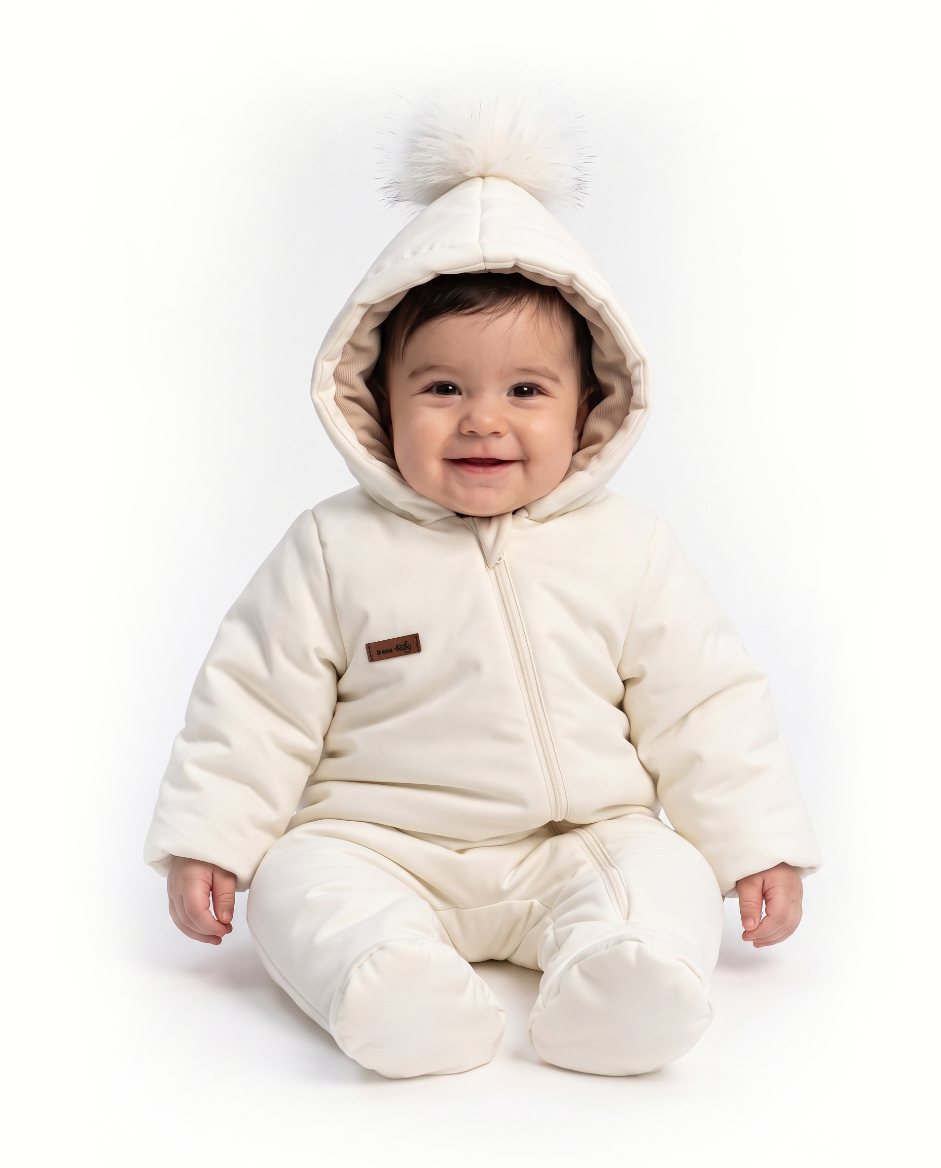 Малыш в зимнем комбинезоне DanaBaby